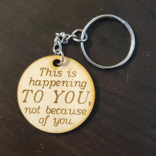 "Happening to you" Keychain