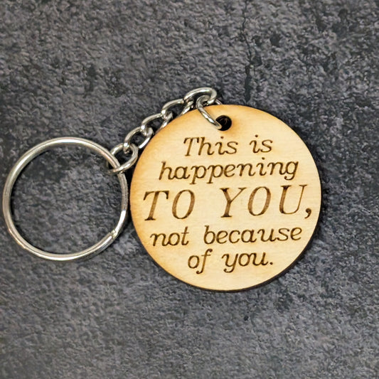 "Happening to you" Keychain