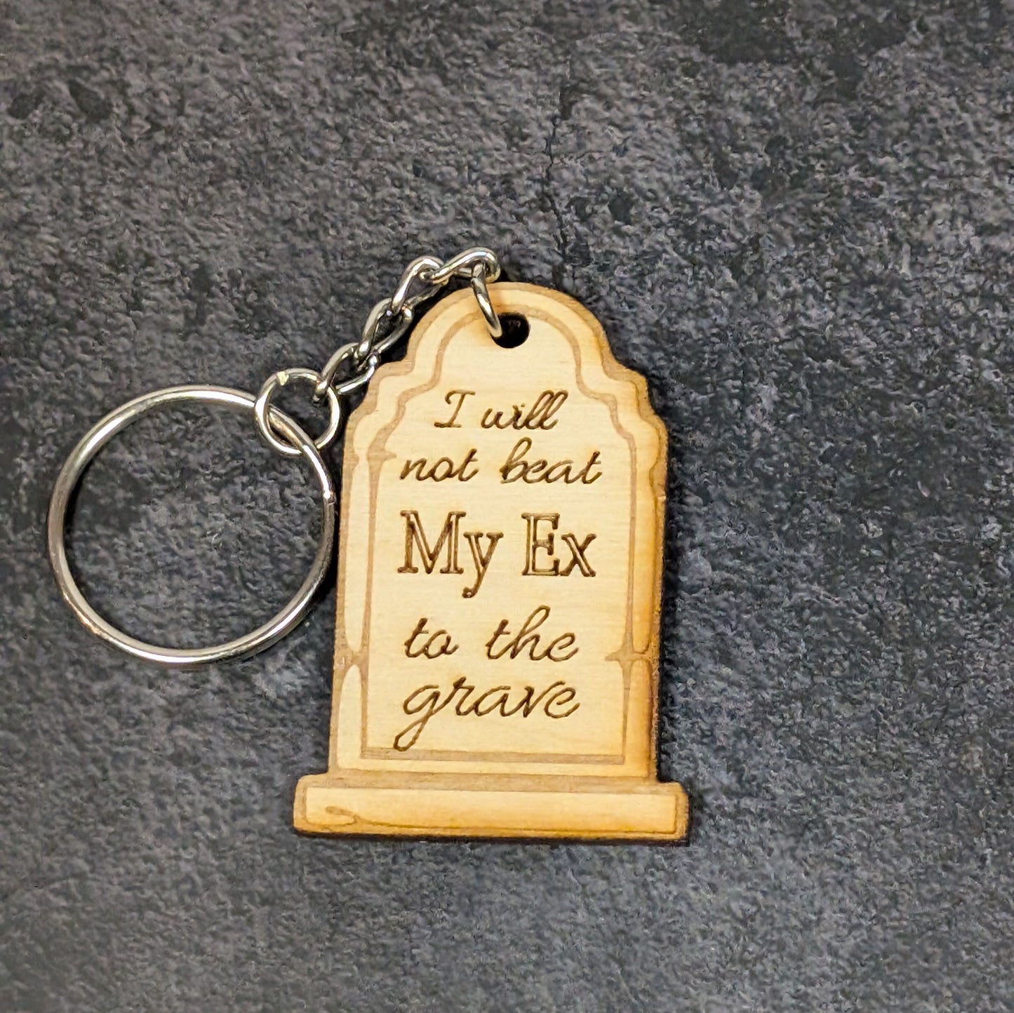 "I won't beat them to the grave" keychain