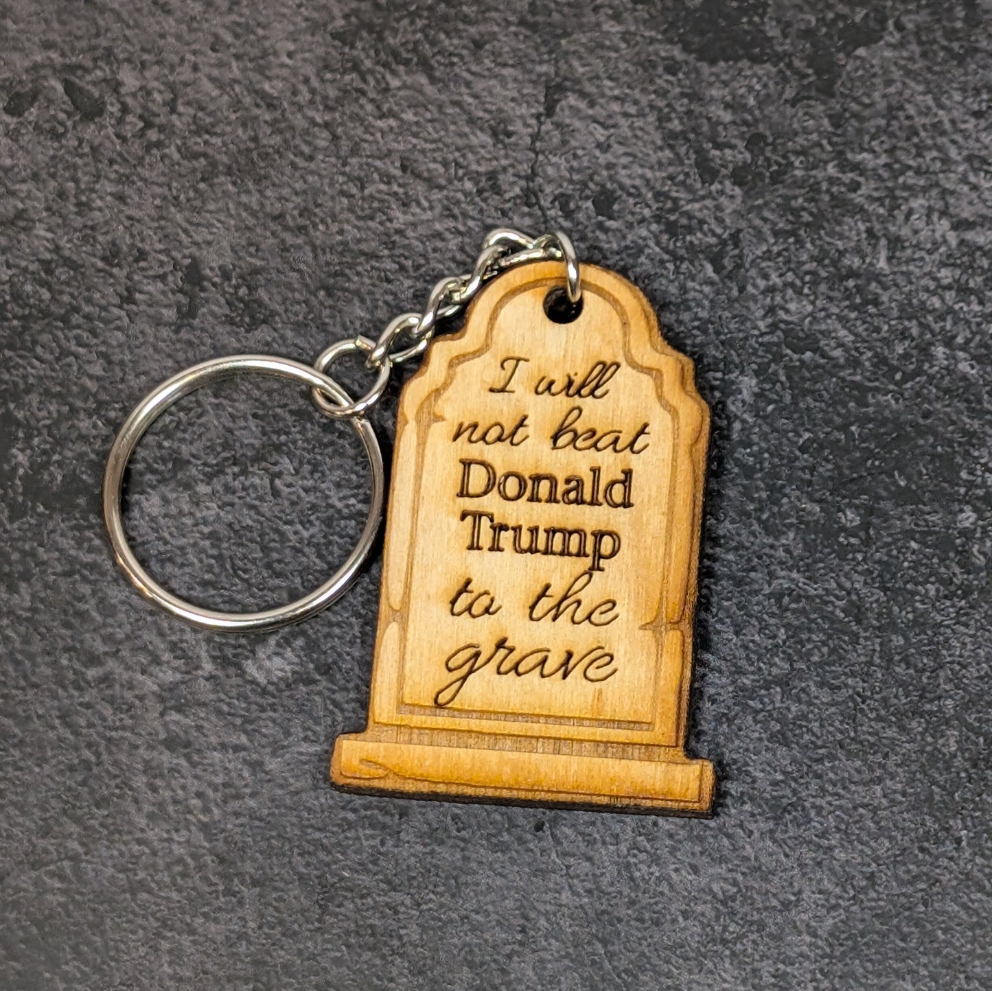 "I won't beat them to the grave" keychain