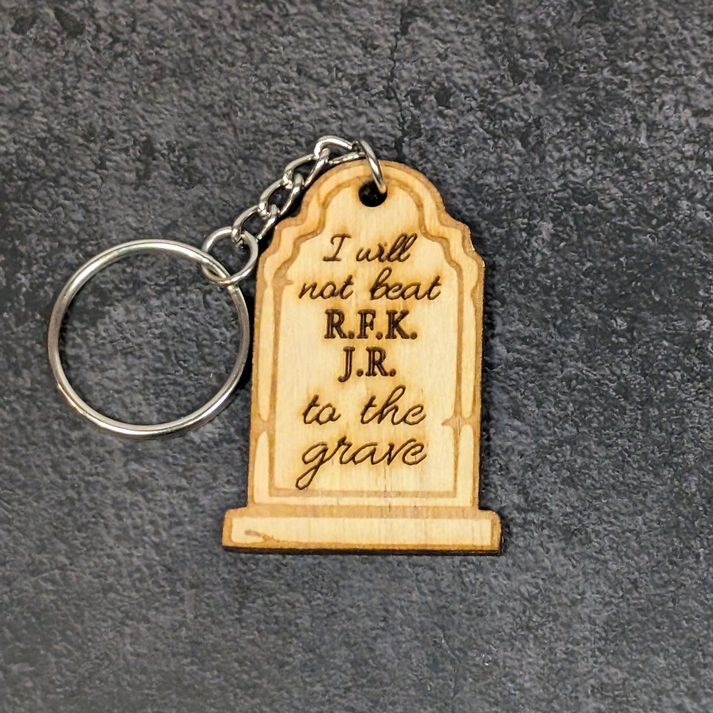 "I won't beat them to the grave" keychain